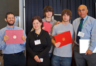 2009 icampus award recipients (L to R) Sacha Zyto 'G, Chris Varenhorst '09 (back), and Justin Cannon '08 with OEIT's Dr. Violeta Ivanova and director Dr. Vijay Kumar (far right)